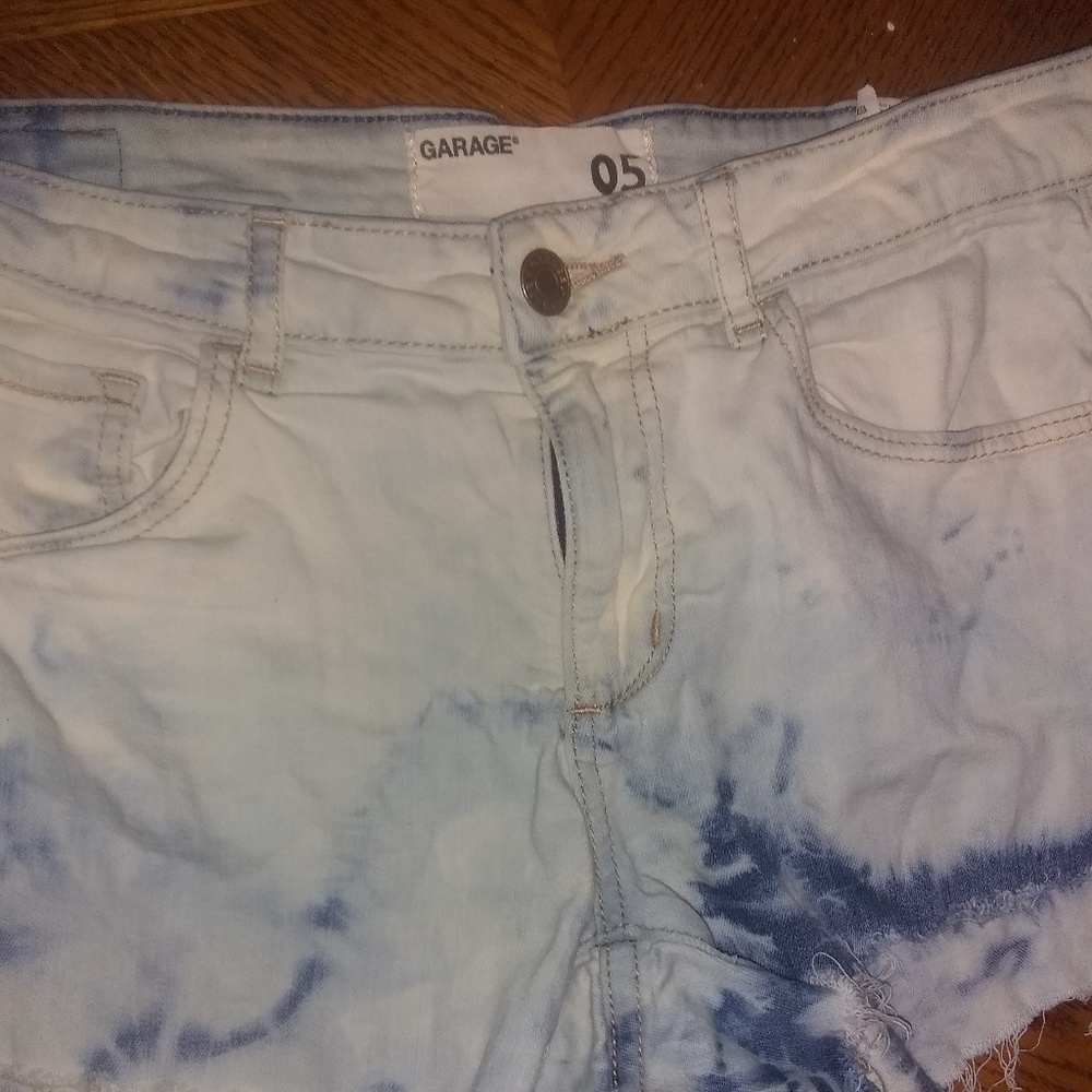 A pair of shirts size 5